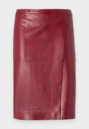 Red faux leather pencil skirt with crocodile texture, straight cut, and knee-length design.