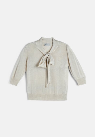 Pull à manches longues couleur crème avec un nœud noué à l'avant et des poignets et un ourlet côtelés, posé à plat sur fond blanc.