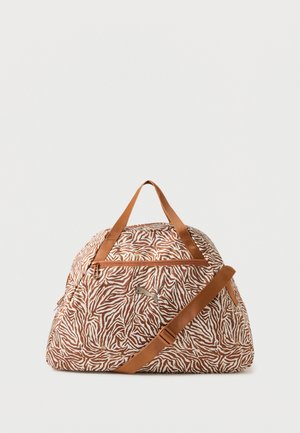 Borsa da viaggio in stampa zebrata marrone e bianca con manici beige e tracolla regolabile, tasca frontale con cerniera e logo Puma.