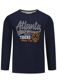 Marineblauw langemouwen shirt van katoen, met witte en gouden tekst "Atlanta 92 Tigers" en een tijgerafbeelding. Gladde textuur, ronde halslijn.