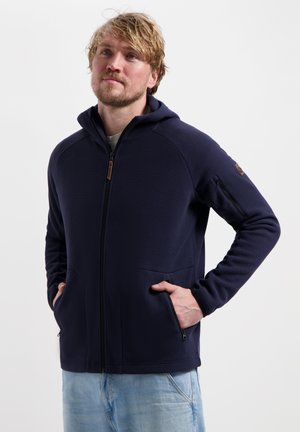 Navy zip-up hoodie van textiel met zijzakken, een capuchon en een klein logopatch op de linkermouw.
