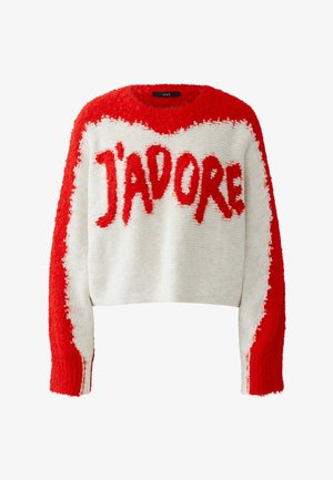 Crochet sweater with a fuzzy texture; features red accents and the word "J'ADORE" prominently in red on a white background.