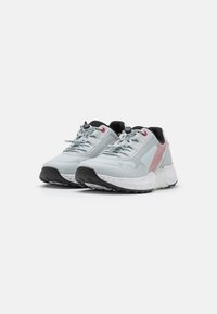 Light gray athletic shoes with mesh upper, black accents, and a textured white sole. Features red hardware and a rounded toe design.