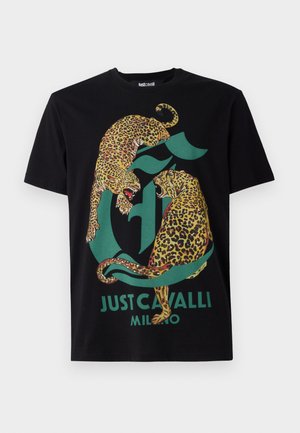 Black cotton t-shirt featuring a graphic design of two leopards in vibrant colors and "JUST CAVALLI MILANO" text in green.