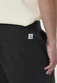 Matinique MACHINO PLEAT  - Pantalon classique - black