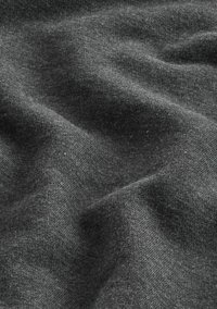 Dark gray fabric with a soft, smooth texture, featuring a slight sheen and subtle variations in shading, creating gentle ripples.