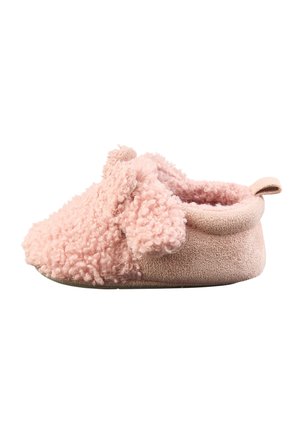 Soft pink baby slipper with curly fabric and a small loop at the heel, designed for comfort and warmth.