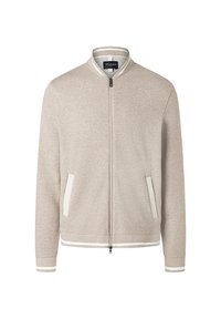 Giacca bomber beige con zip, bordata di bianco su colletto, polsini e orlo, dotata di due tasche laterali e chiusura frontale con zip.