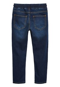 Jeans in denim blu scuro con una comoda cintura elasticizzata, due tasche posteriori e cuciture gialle a contrasto lungo le cuciture.