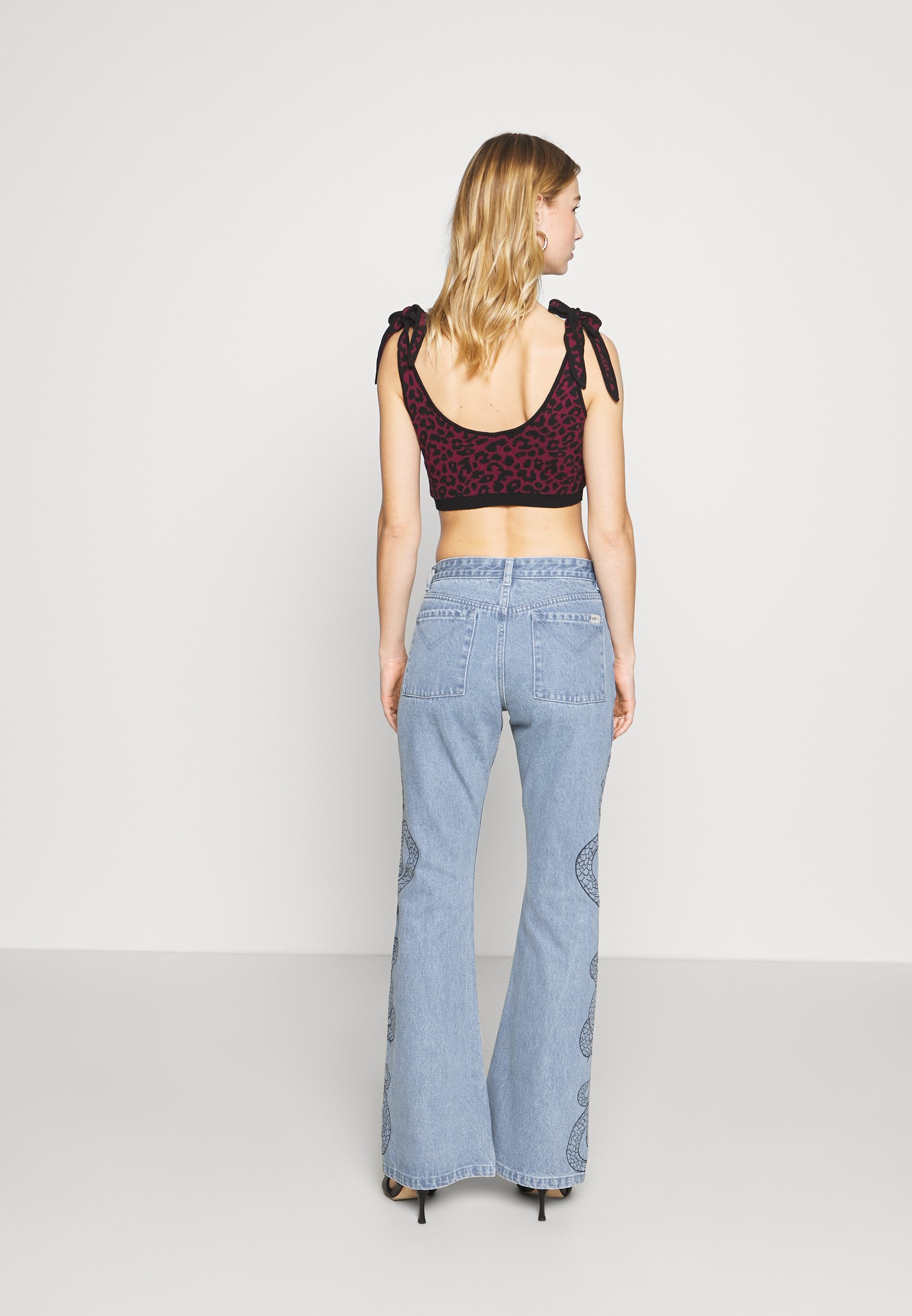 Milk it SIDE SEAM SNAKE PRINT - Flared 