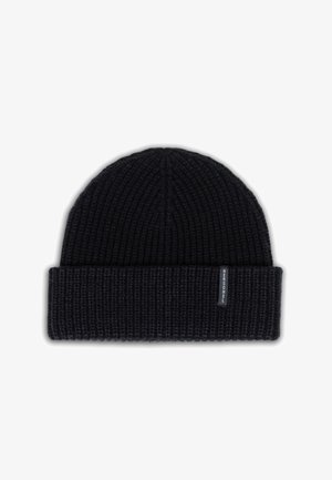 Knitted beanie hat in black with a foldable brim, featuring a textured ribbed pattern and a small branded label on the side.