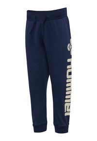 Marineblauwe katoen joggers met een elastische tailleband, verstelbare trekkoord en een groot crèmekleurig logo dat verticaal op het linkerbeen is gedrukt.