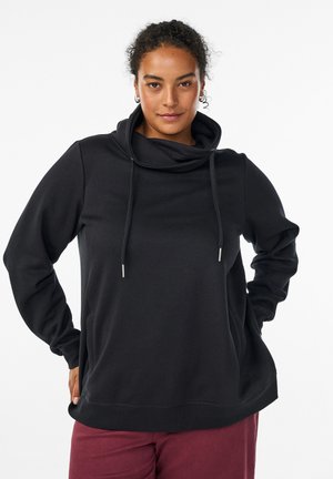 Black hooded sweatshirt with a cowl neck, drawstrings, long sleeves, side pockets, and a relaxed fit. Smooth fabric texture, no patterns.