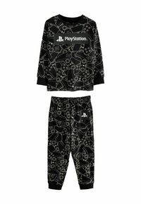 Ensemble de pyjama noir comprenant un haut à manches longues et un pantalon. Le design inclut des contours de manettes de jeu et le logo PlayStation en blanc.