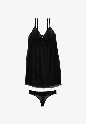 Babydoll noir orné de dentelle avec des bretelles ajustables et un tissu fluide et transparent. Comprend un string noir transparent assorti.