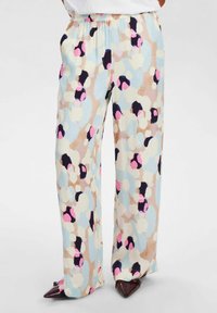 Pantaloni leggeri a gamba larga con cintura elastica, caratterizzati da un motivo astratto multicolore in tonalità pastello e accenti scuri.