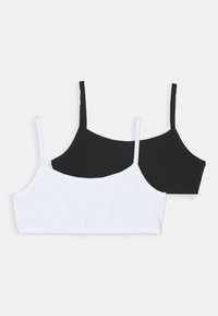 To basiske crop topper i svart og hvitt bomull, med tynne stropper og et enkelt design med en stretchy kant langs bunnen.