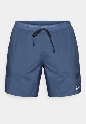 Marineblaue Sportshorts aus leichtem Material, mit einem elastischen Bund und Kordelzug sowie Seitentaschen. Logo-Akzent am Bein.