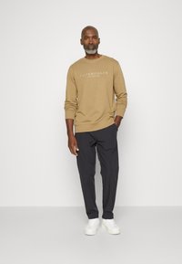 Scotch & Soda FINCH BLEND JOGGER - Stoffhose - deep sea
