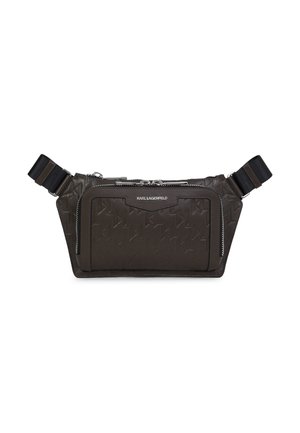 Black nylon belt bag with textured star pattern, silver hardware, two zippered compartments, and adjustable woven strap.