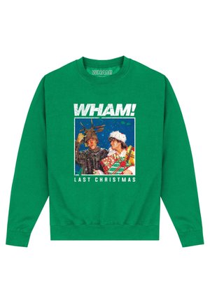 Green sweatshirt with "WHAM!" text above a festive photo of two people in Christmas costumes, holding presents, with "LAST CHRISTMAS" below.