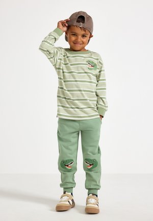 Lindex, LINDEX JOGGERS WITH BRUSHED INSIDE LINDEX - Pantaloni sportivi - light khaki