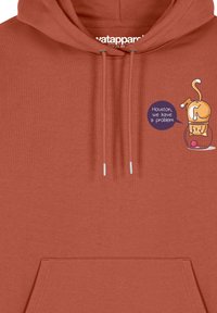 Roodbruine hoodie van zacht materiaal, met een grafisch ontwerp van een kat in een kom met een spreekwolk waarin staat: "Houston, we hebben een probleem."