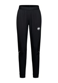 Zwarte sportbroek gemaakt van rekbare stof. Voorzien van een elastische tailleband, taps toelopende benen, reflecterende accenten en een logo nabij de heup.