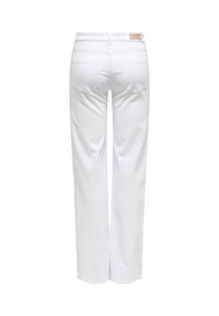 Λευκά τζιν straight-leg με μαλακό, ελαφρώς ελαστικό ύφασμα. Διαθέτει δύο πίσω τσέπες και μια μικρή ετικέτα μάρκας στη μέση.