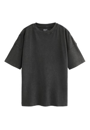 Schwarzes oversized Kurzarm-T-Shirt mit Rundhalsausschnitt und sichtbaren Nahtnähten, dargestellt auf weißem Hintergrund.