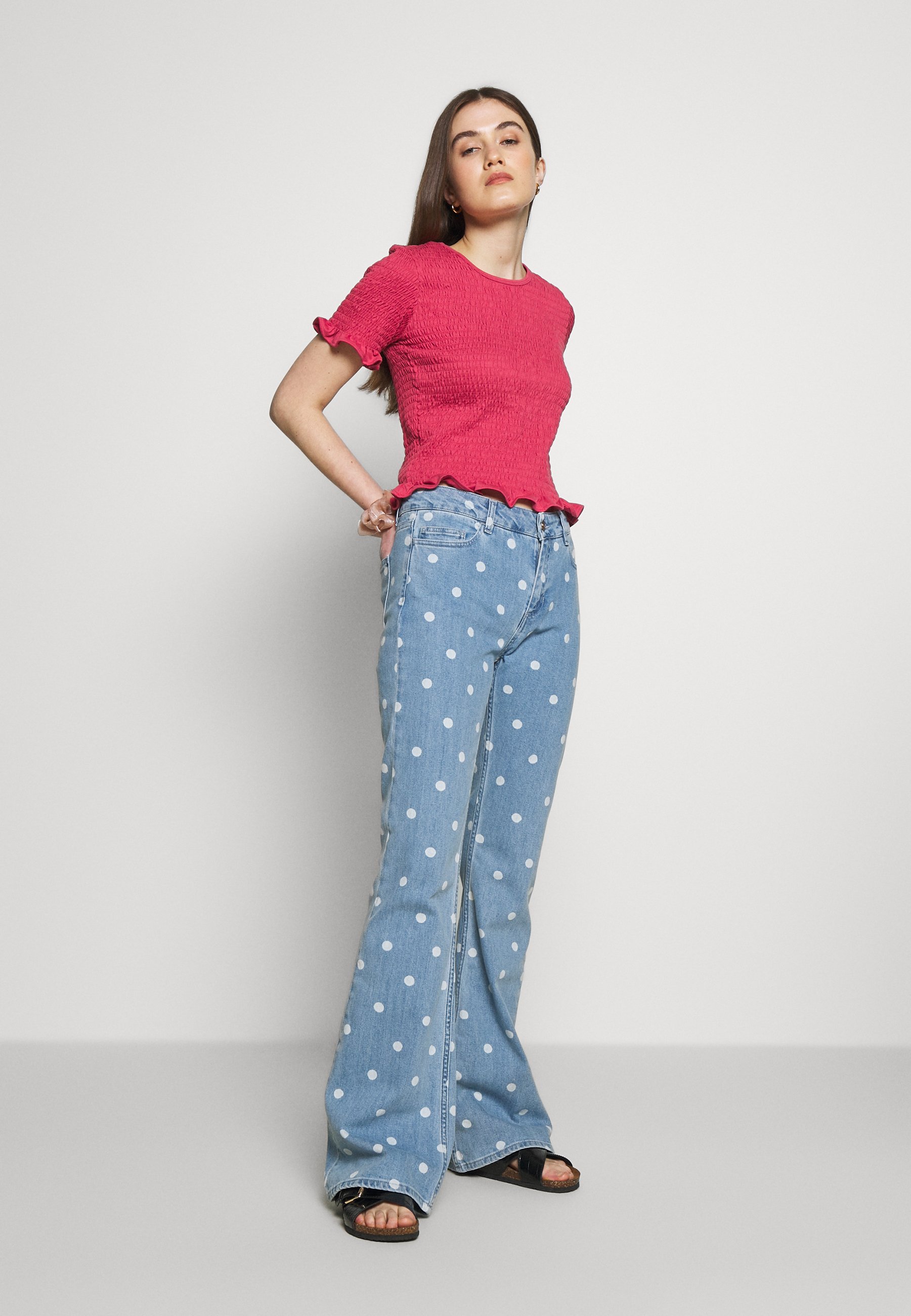 eva printed flared trousers