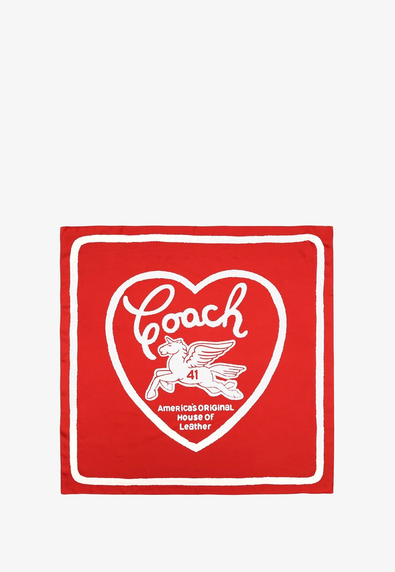 Punainen silkkihuivi, jossa on valkoinen sydänsilhouette, "Coach" -teksti, siivekäs hevonen -kuva ja teksti "Amerikan alkuperäinen nahkatalo".