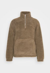 Fleecetop in hellbraun mit Halb-Reißverschlusskragen, langen Ärmeln und einer Fronttasche; weiche Textur mit flauschigem Finish.