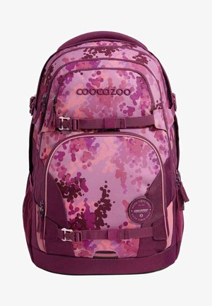Backpack with a purple camouflage pattern, featuring various shades of pink and violet, fabric material, multiple zippered compartments, and adjustable straps.