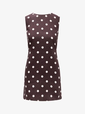 Φόρεμα χωρίς μανίκια από σκούρο καφέ ύφασμα με λευκές πουά. Διαθέτει στρογγυλή λαιμόκοψη και ίσια, μήκους μέχρι το γόνατο, γραμμή.