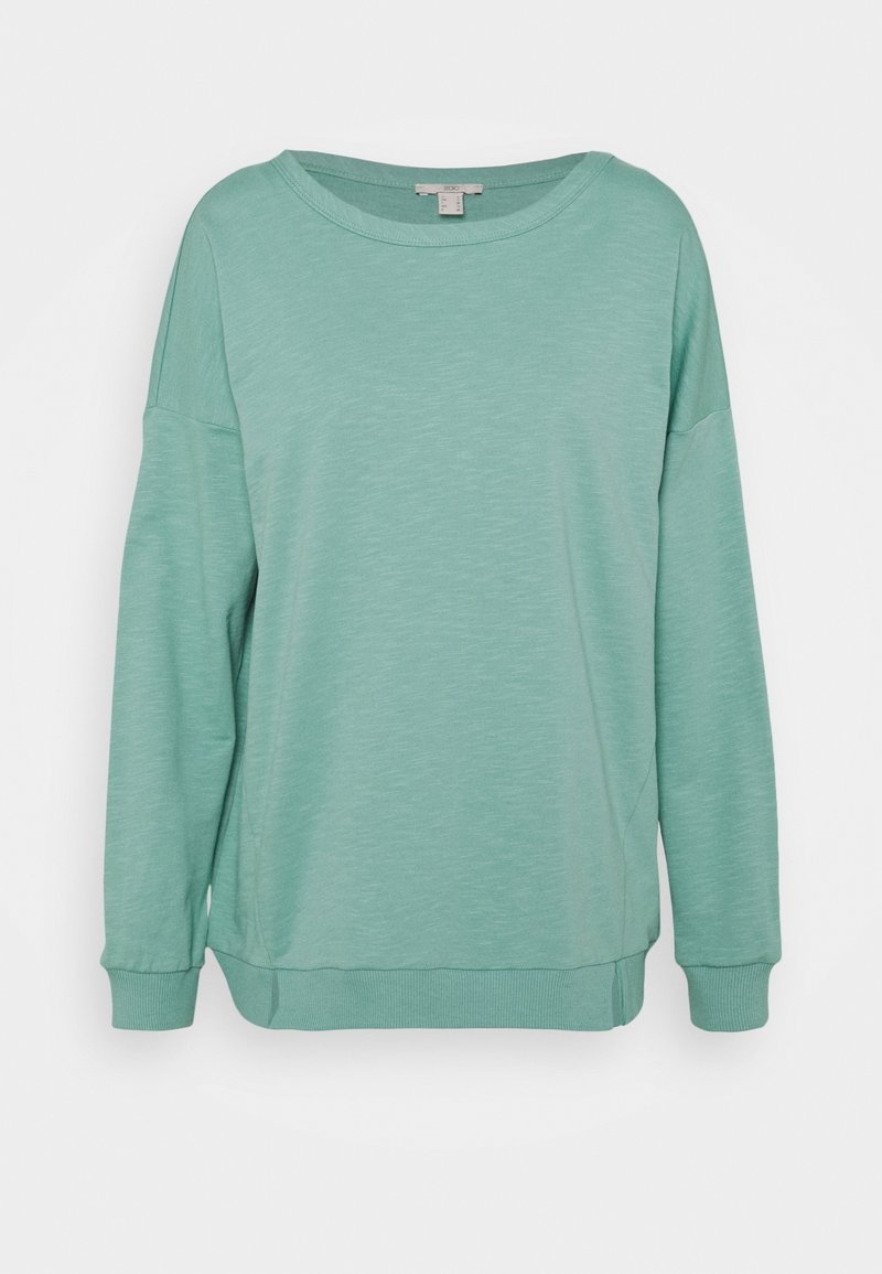 Sweat-shirt vert clair à manches longues avec poignets et ourlet côtelés, col rond et coupe décontractée, présenté sur fond blanc.