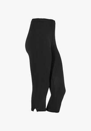 Sorte cropped leggings med elastisk talje og små sidesplitter i den nederste kant, vist fra en sidevinkel.