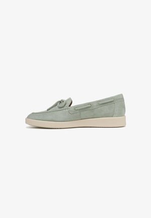 Light green suede slip-on shoes with a rounded toe, decorative knot detail, and beige rubber sole. Subtle stitching accents along sides.