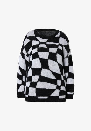 Zwart-wit gemusterde trui, met een zachte, pluizige textuur, oversized pasvorm, ronde halslijn en abstracte vormen over de stof.