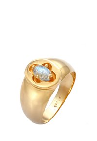 Gold-colored ring featuring a large, oval labradorite stone set in a smooth, polished band. Engraved with "925" for silver content.