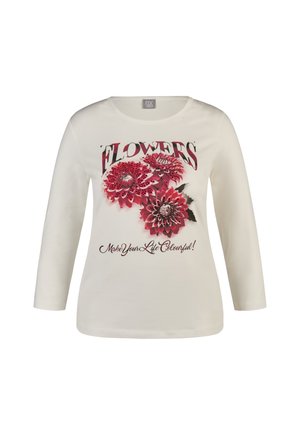 White long-sleeve shirt with red flower graphics and text "FLOWERS" and "Make Your Life Colourful!" on front.