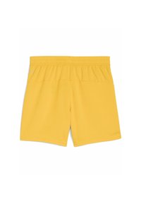 Pantalones deportivos amarillos con una textura suave, cinturilla elástica y dos bolsillos traseros. Diseño simple con un tejido transpirable.