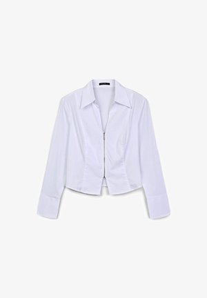 Weißes verkürztes Hemd mit einem Reißverschluss vorn, langen Ärmeln und einem klassischen Kragen. Glatte Textur mit strukturierten Nähten und einer enganliegenden Passform.