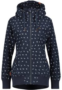 Marinblå huvjacka med vitt fågelmönster, framdragkedja, dragsko, manchetter och fåll i ribbad design, avsedd för avslappnad användning.