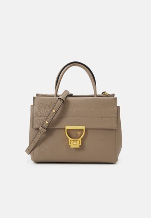 Leather handbag in taupe, structured design with a top handle and removable strap. Features a gold hardware clasp and textured surface.