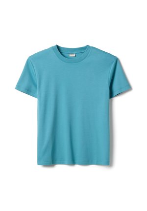 T-shirt uni turquoise à manches courtes et col rond, posé à plat sur un fond blanc.