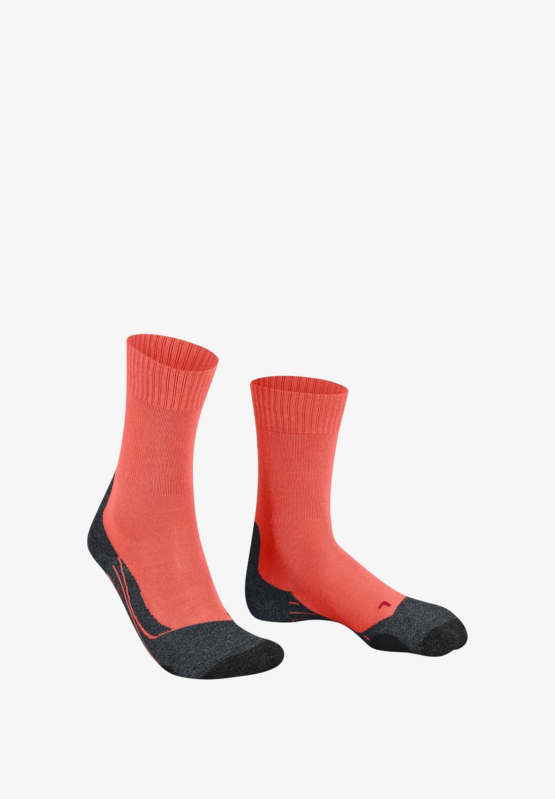 Koralowe i ciemnoszare sportowe skarpetki. Żebrowane wokół kostki, wzmocnione na palcach i pięcie, gładka faktura z kontrastowymi kolorowymi akcentami.