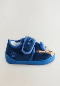 Chausson bleu pour tout-petit avec bande velcro, doublure douce, empreinte de patte sur le côté et visage de chien brodé avec oreilles sur le bout.