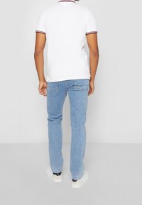 Tommy Hilfiger Pikeepaita - white