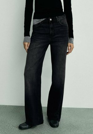Jeans a zampa - black denim